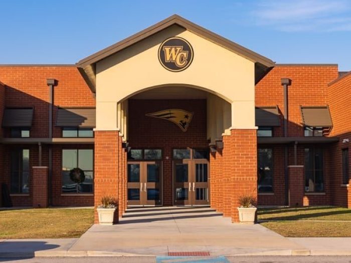 Front entrance of a Wilcox County school building in the morning